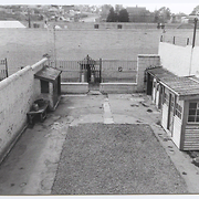Campbell Street Gaol, Hobart - Courtyard view towards external wall and the Glebe